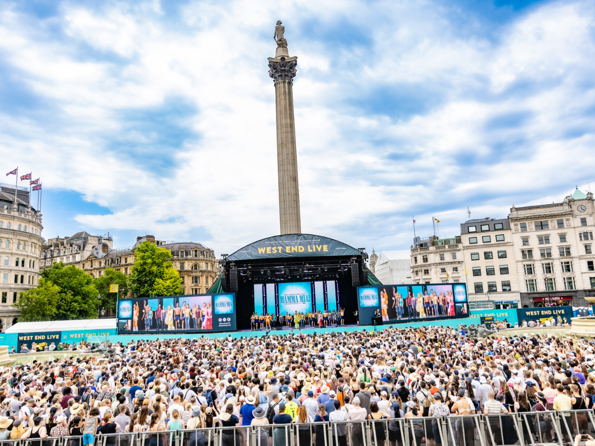 View of West End LIVE! Featuring a crowd and Nelson's Column on Trafalgar Square